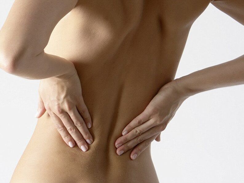 Why does the back pain in the lower back occur